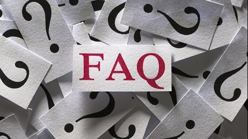 Pile of question marks under an FAQ
